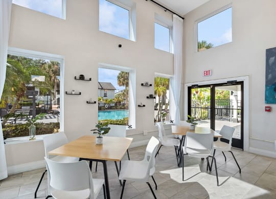 Community Clubhouse with Lounge Furniture at Rosehill Preserve Apartments in Orlando, FL.