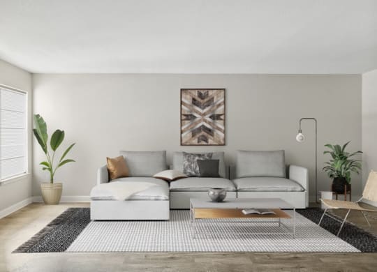 Model living room with light colored sofa