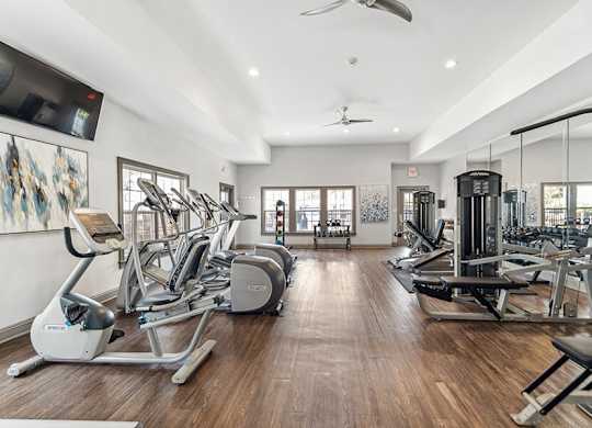 Community Fitness Center with Equipment at Lake Cameron Apartments located in Apex, NC.