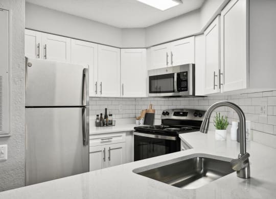 Model kitchen with stainless steel appliances