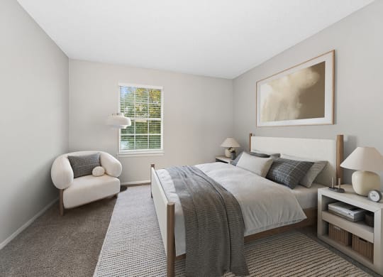 Model Bedroom with Carpet and Window View at Walden Lake Apartments in Plant City, FL.