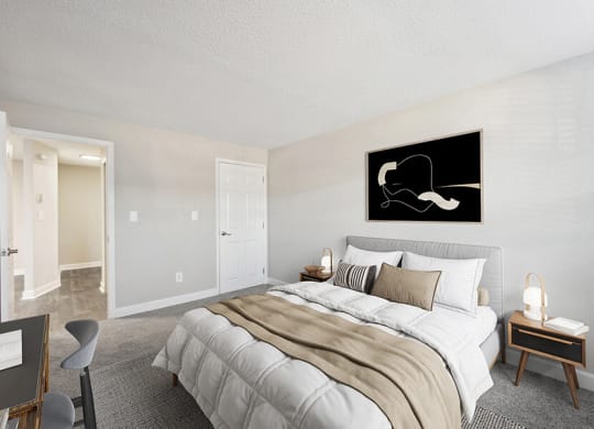 Model Bedroom with Carpet and Hallway View at Middlesex Crossing Apartments in Billerica, MA.