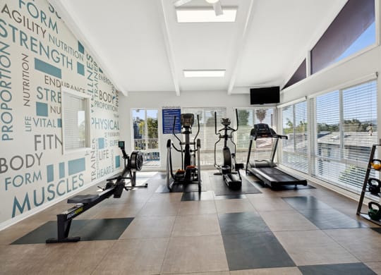 Community Fitness Center with Equipment at Colonnade at Fletcher Hills Apartments in El Cajon, CA.