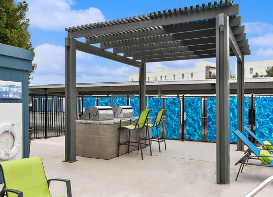 Outdoor BBQ Area with Furniture at Meritage Apartments in Vallejo, CA.