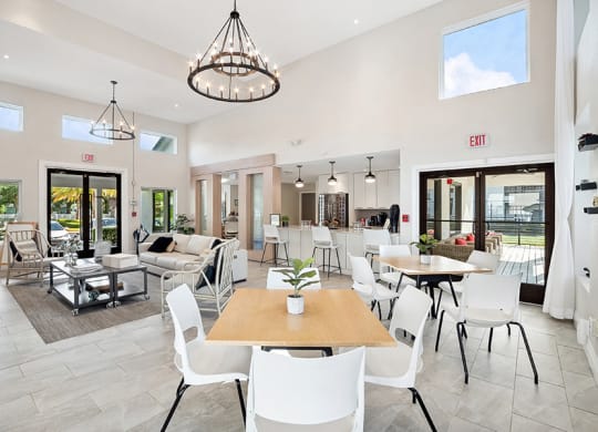 Community Clubhouse with Lounge Furniture at Rosehill Preserve Apartments in Orlando, FL.