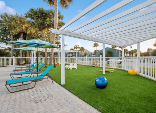 Outdoor Lounge Area with Covered Furniture at Park at 7200 Apartments in Jacksonville, FL.