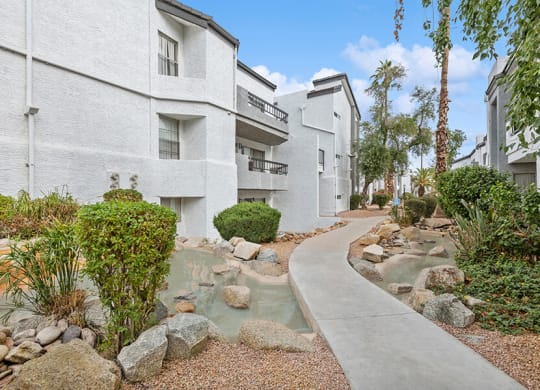 Exterior Community Building and Landscape at Crystal Creek Apartments in Phoenix, AZ.