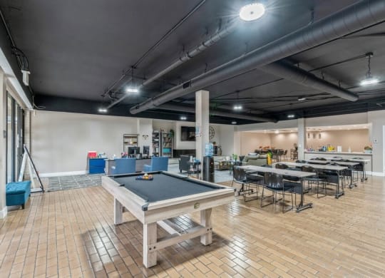 Clubhouse game room with pool table