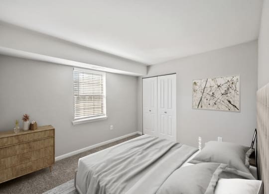 Model bedroom with large windows