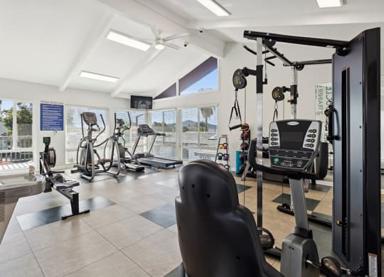 Community Fitness Center with Equipment at Colonnade at Fletcher Hills Apartments in El Cajon, CA.