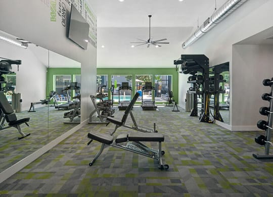 Community Fitness Center with Equipment at Overlook Apartments located in Salt Lake City, UT.
