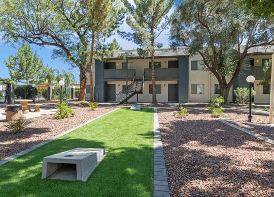 Outdoor Corn Hole Area at Solano Springs Apartments in Tucson, AZ.