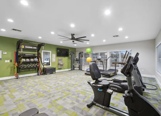 Community Fitness Center with Equipment at Park at 7200 Apartments in Jacksonville, FL.