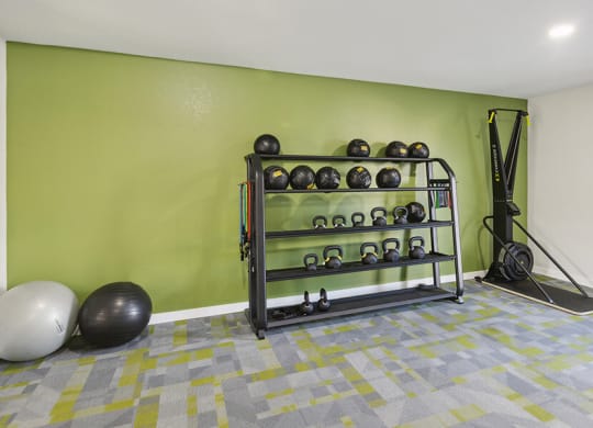 Community Fitness Center with Equipment at Tanque Verde Apartments located in Tucson, AZ.