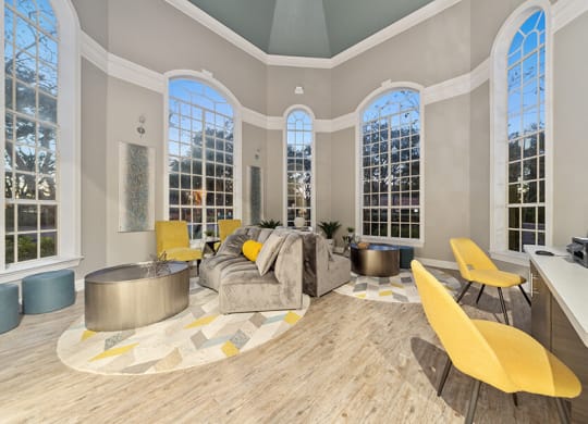 Community Clubhouse with Lounge Furniture at Vinings at Hunter's Green Apartments in Tampa, FL.