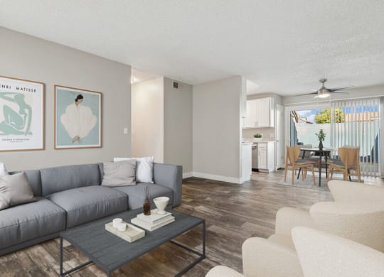 Model Living Room with Wood-Style Flooring at Peaks on 4th Apartments in Avondale, AZ.