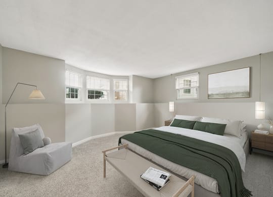 Model Bedroom with Carpet and Window Views at Meadows at Marlborough Apartments located in Marlborough, MA.