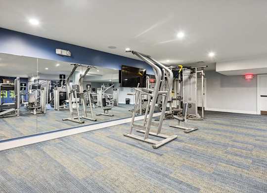 Community Fitness Center with Equipment at Dulles Green Apartments located in Herndon, VA.