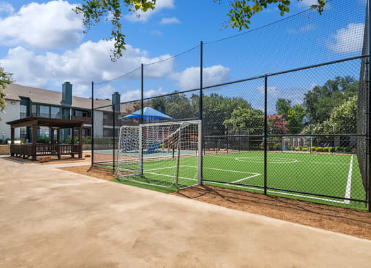 Community Soccer Field with Nets at Bridges at Deer Run Apartments in Dallas, TX.