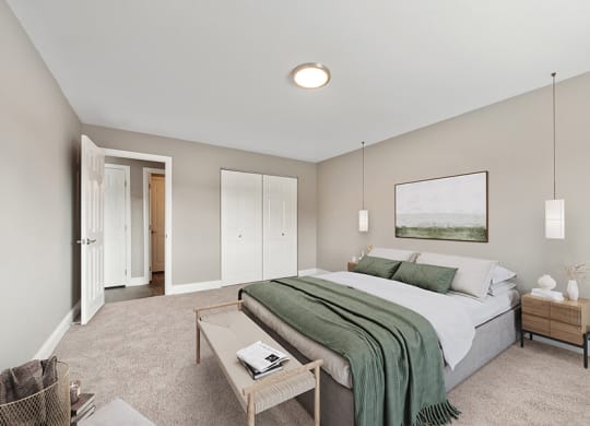 Model Bedroom with Carpet and Closet  at Heights at Marlborough Apartments located in Marlborough, MA.