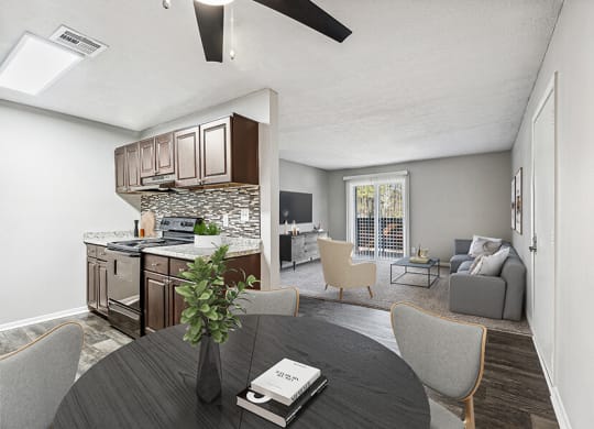 Model Dining Room and Kitchen Area with Wood-Style Flooring at Paramont Apartments in Duluth, GA.
