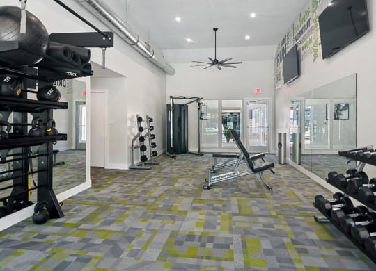Community Fitness Center with Equipment at Overlook Apartments located in Salt Lake City, UT.