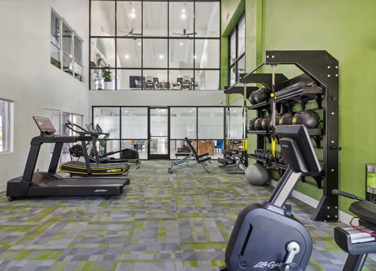 Community Fitness Center with Equipment at Meadow Ridge Apartments located in Las Vegas, NV.