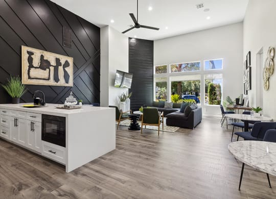 Community Clubhouse with Lounge Furniture, TV & Kitchenette Area at Monterra Apartments located in Las Vegas, NV.