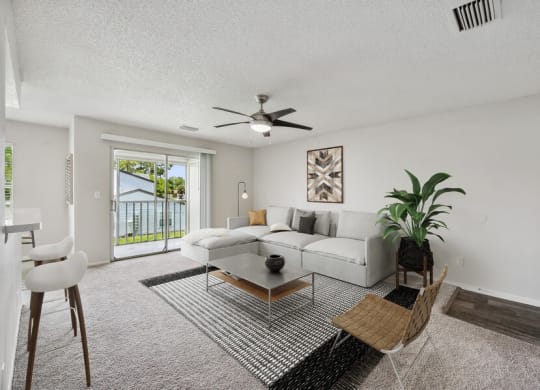 Model living room with patio door