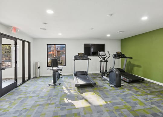 Community Fitness Center with Equipment at Tanque Verde Apartments located in Tucson, AZ.