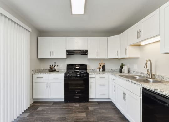 Model kitchen with updated white cabinets