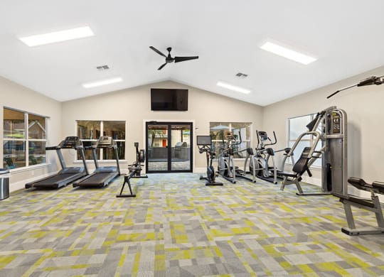 Community Fitness Center with Equipment at Retreat at Crosstown Apartments in Riverview, FL.