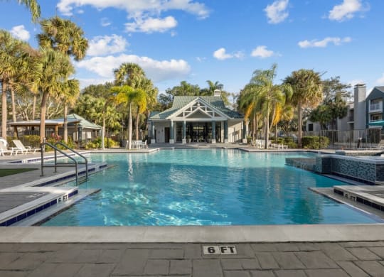 Community Pool and Clubhouse at Caribbean Breeze Apartments in Tampa, FL.
