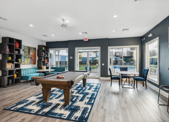 Game room with billiards table at Park West Apartments in Houston, Texas