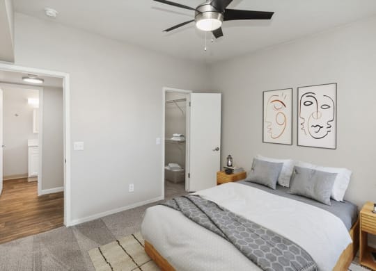 Model bedroom with walk-in closet