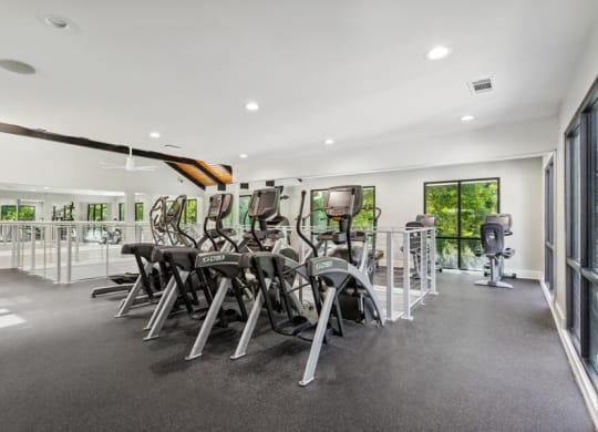 Community Fitness Center with Equipment at Dunwoody Village Apartments in Atlanta, GA.