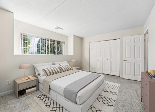 Model Bedroom with Carpet and Closet at Heights Marlborough Apartments in Boston, MA.