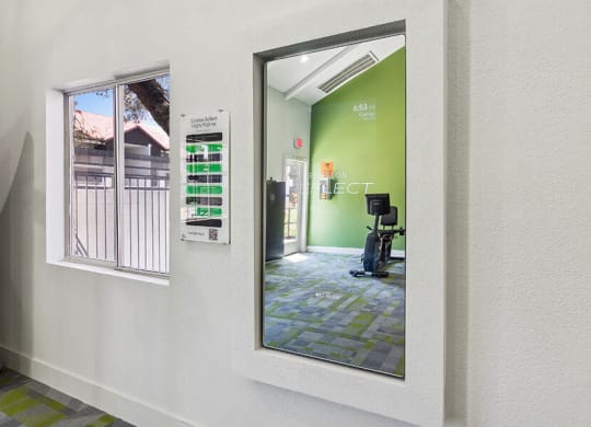 Community Fitness Center with Equipment at Meadow Ridge Apartments located in Las Vegas, NV.