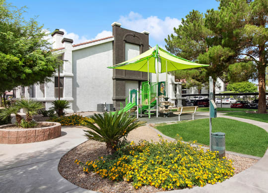 Exterior Landscape and View of Playground at Meadow Ridge Apartments in Las Vegas, NV.