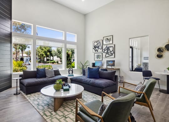 Community Clubhouse with Lounge Furniture and TV at Monterra Apartments located in Las Vegas, NV.