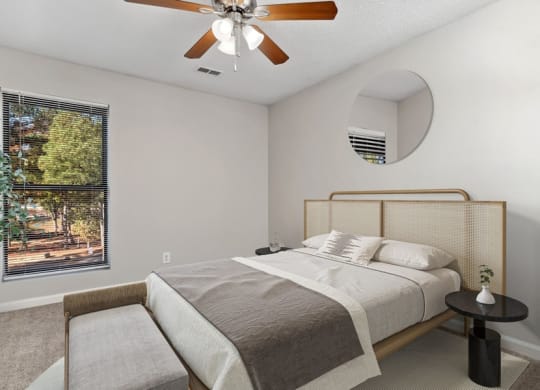 Model bedroom with ceiling fan