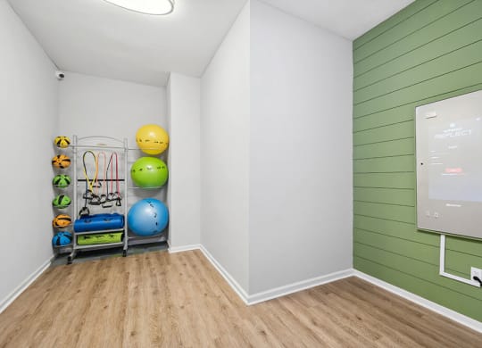 Community Fitness Center with Equipment at Westland Park Apartments in Jacksonville, FL.