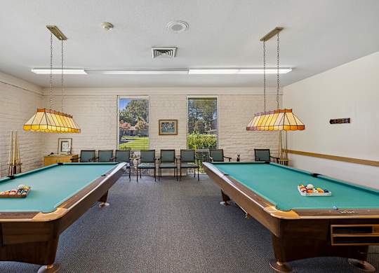 the preserve at ballantyne commons pool room with two pool tables