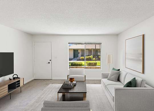 Model Living Room with Carpet at Walnut Creek Apartments located in Walnut Creek, CA.