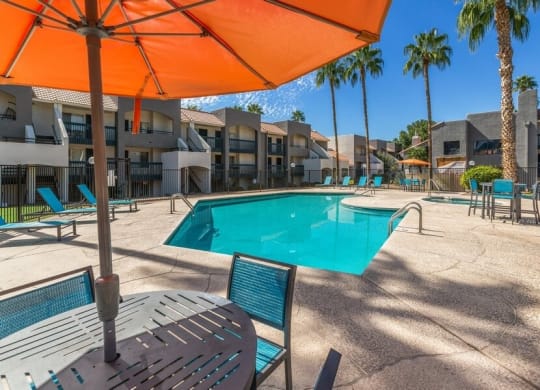 Poolside cabanas and palm trees