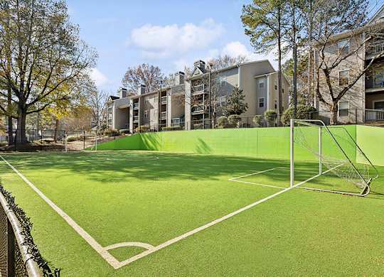 Community Soccer Field with Nets at Element 41 Apartments located in Marietta, GA.