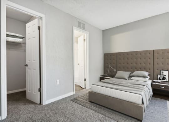Model bedroom with walk-in closet