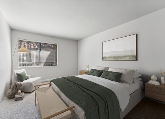 Model Bedroom with Carpet and Window View at Creek at 2645 Apartments located in Sacramento, CA.