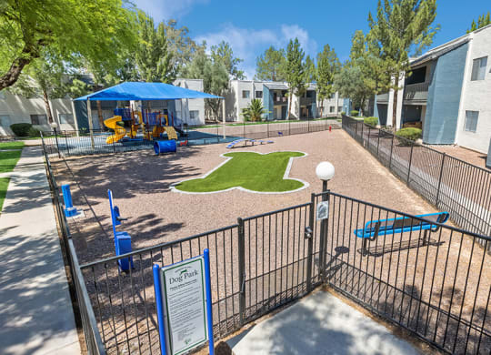 Community Dog Park with Agility Equipment at Solano Springs Apartments in Tucson, AZ.