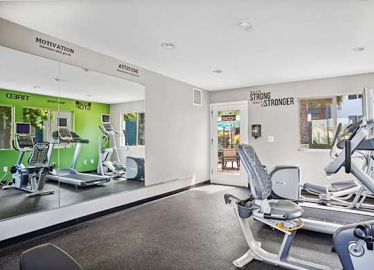 Community Fitness Center with Equipment at Cove La Mesa Apartments located in La Mesa, CA.